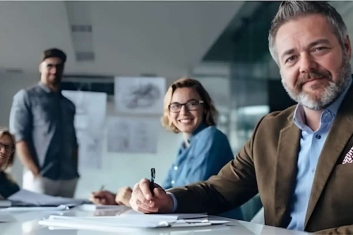 Entrepreneurs working together with advisors to manage business formation and state filings through InCorp services.