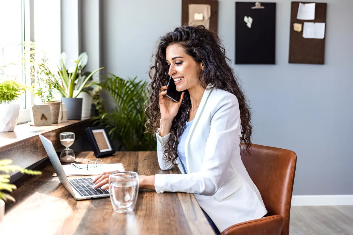 Business owner managing annual report filing deadlines online to avoid penalties and maintain LLC or corporation good standing status.