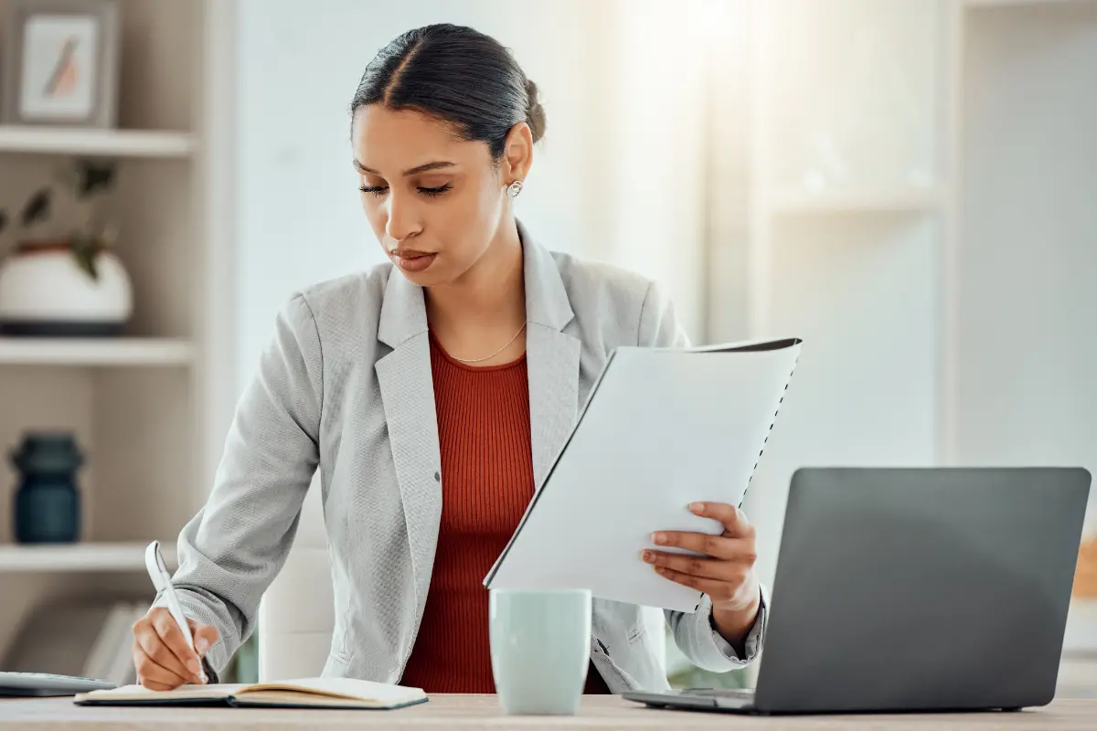 Business owner reviewing Articles of Incorporation filing requirements and corporate formation documents needed to incorporate a business and meet certificate of incorporation requirements in 2026.