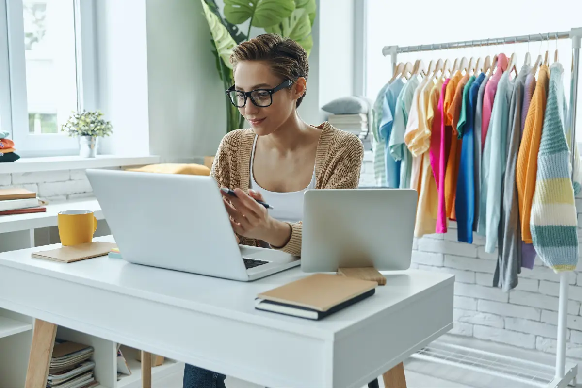 E-commerce LLC owner managing her online retail business from home while researching registered agent services to maintain LLC compliance and protect her personal address from public records.