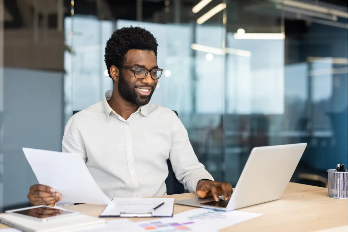 Business owner reviewing foreign qualification documents to register business in another state and expand operations