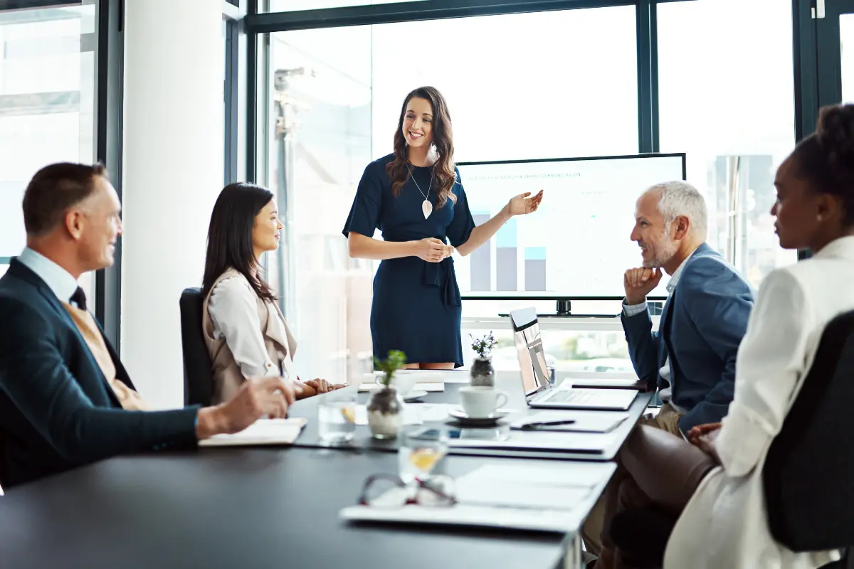 Founder presenting business strategy to a board of directors during a corporate governance and decision-making meeting