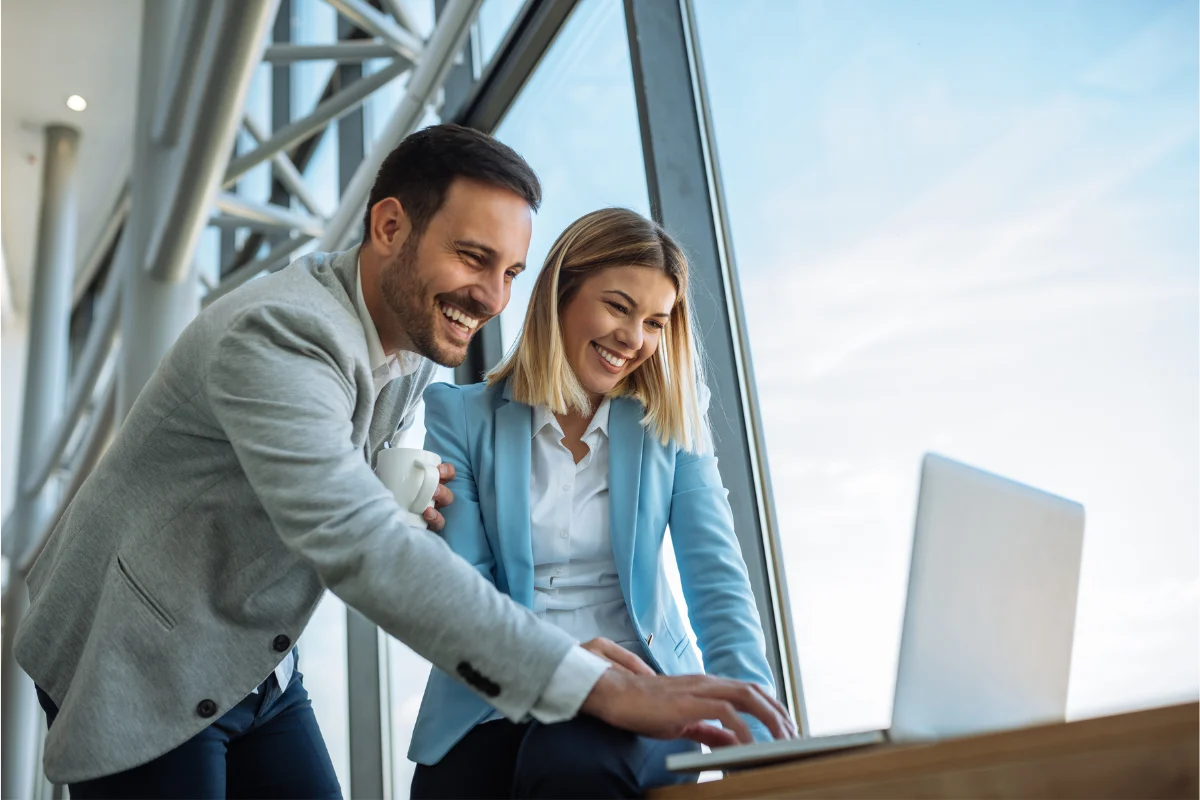 Business professionals consulting on hiring registered agent services for company compliance and legal document handling requirements.