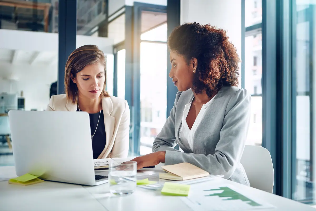 Business owners comparing registered agent services and reviewing state requirements for compliance and eligibility