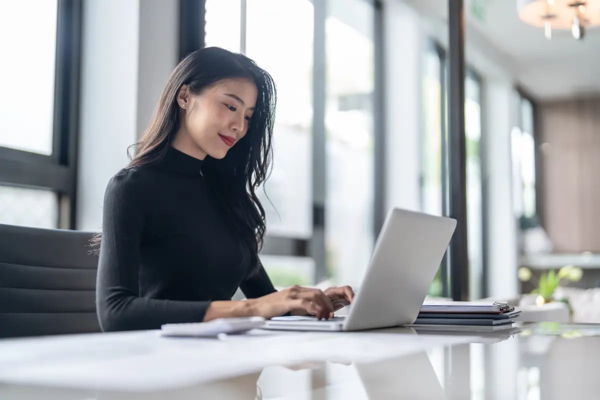 Business owner researching best registered agent service online to meet registered agent requirements and maintain LLC compliance