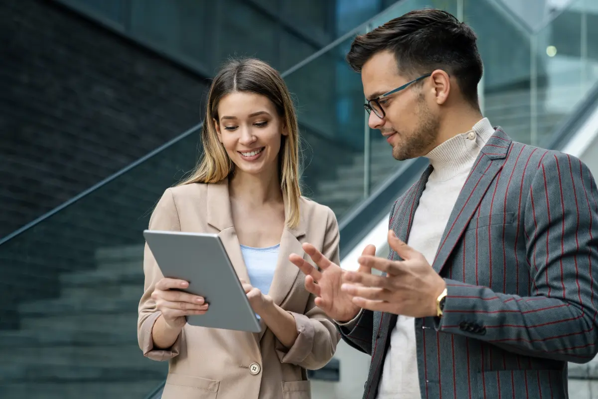 Business professionals discussing LLC liability protection and operating agreement requirements to maintain personal asset protection from business debts