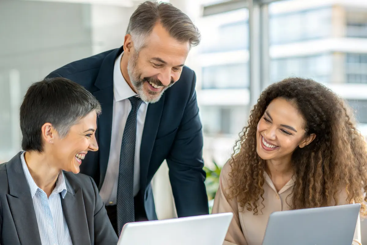 Business team consulting on how to switch registered agent providers discussing legal compliance requirements and professional registered agent services transition.