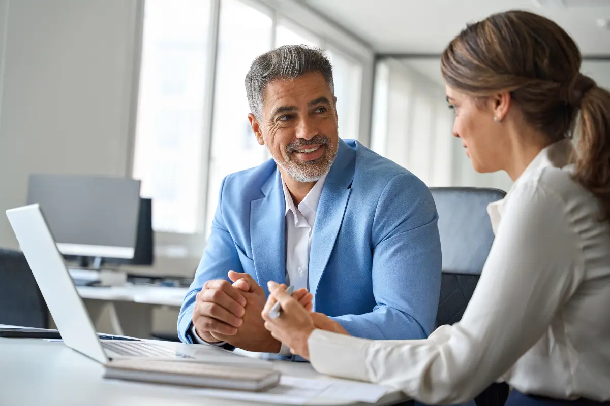 Business professionals consulting on registered agent and incorporation services for company formation and legal compliance requirements
