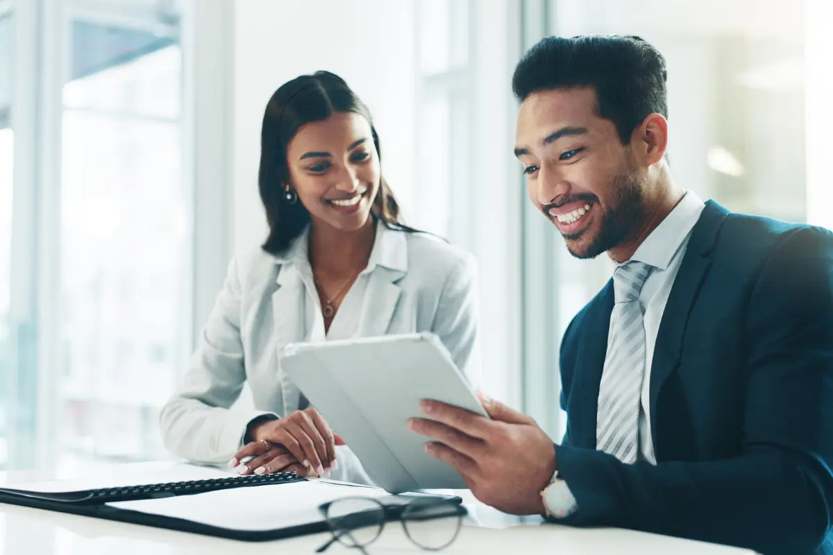 Business professionals consulting on dissolved business reinstatement process and compliance requirements to restore good standing with state authorities.