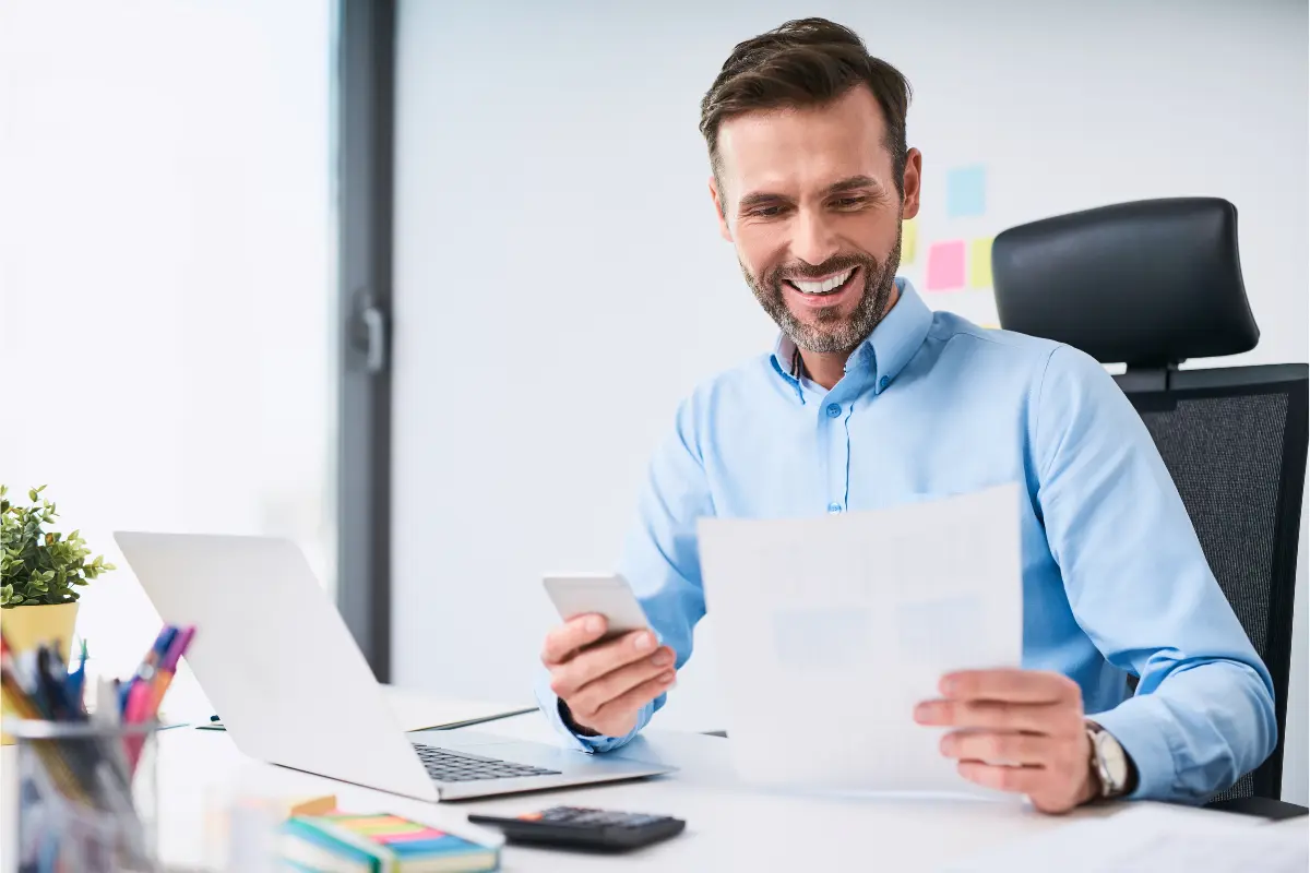 Business owner reviewing tax implications and state tax compliance documents for multi-state business expansion