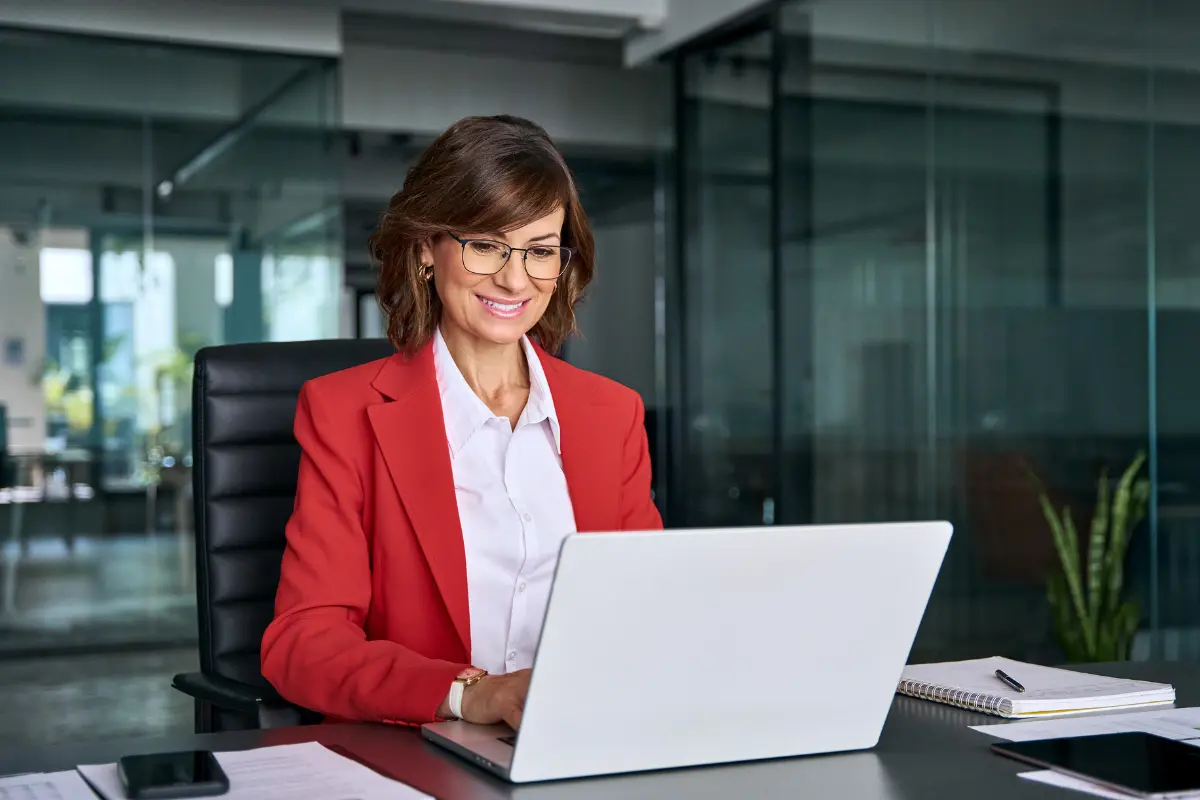 Tech startup founder researching LLC versus corporation legal structure options on laptop for venture capital ready incorporation